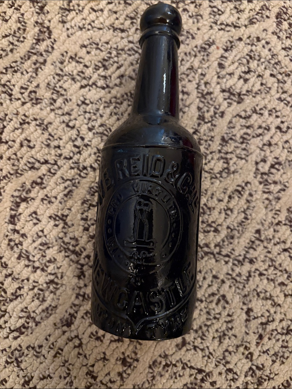 Vintage Black English Embossed Glass Beer Bottle